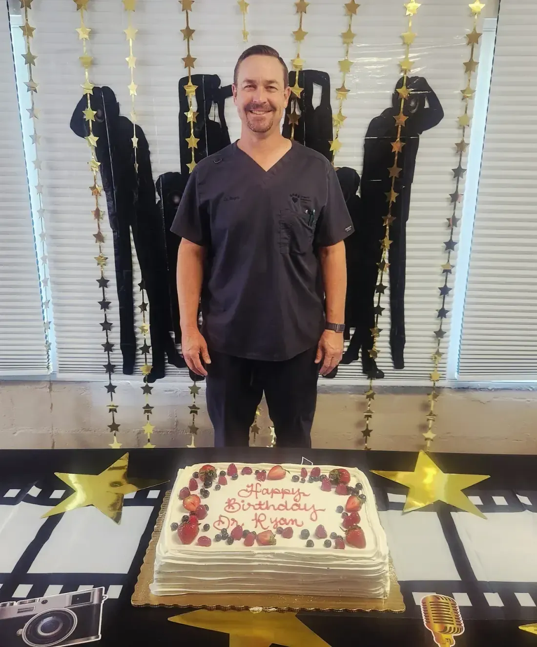 Dr. Ryan celebrating his birthday with the Gregory Veterinary Clinic team